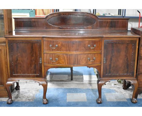 An Edwardian Mahogany Galleried Sideboard with Bowed Breakfront Having Cutlery Drawer and One Drawer Under, Side Cupboards wi