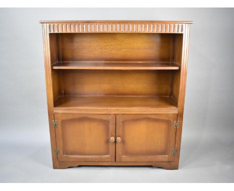 A Mid 20th Century Oak Two Shelf Bookcase with Cupboard Base, 97cms Wide 