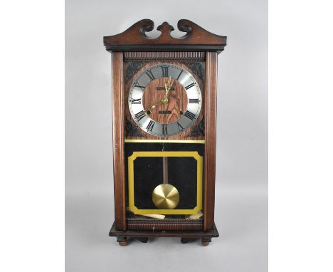 A President 31 Day Wall Clock 58cm high and 29cm wide 