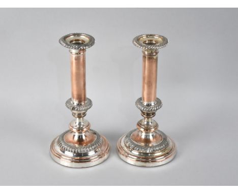 A Pair of Sheffield Plate Candlestick, Weighted Bases, Stamped To Holders "Warranted Silver Edges", 21.5cm High 