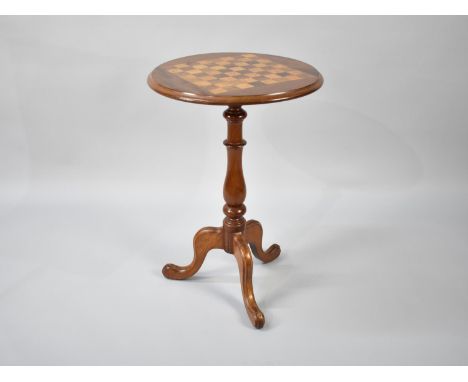 A Circular 19th Century Tripod Games Table with Chess Board Top in Rosewood, Maple and Mahogany, 48cms Diameter 