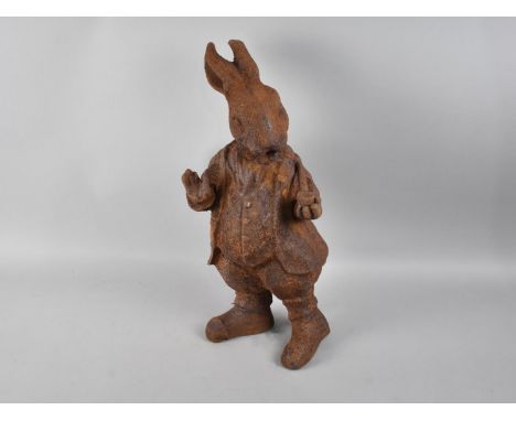 A Rusted Metal Garden Ornament in The Form of a Anthropomorphic Rabbit with Pipe, 43cm high 
