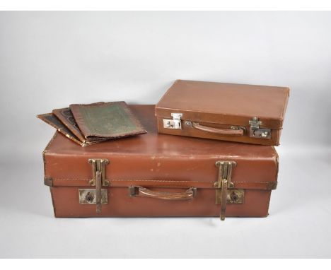 A Vintage Suitcase, Fitted Document Case and Three Continental Tooled Leather Blotting Pads 