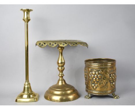 A Tall Brass Candlestick, 36cm high, a Late Victorian Pierced Trivet and a Later Brass Planter with Three Claw Feet 