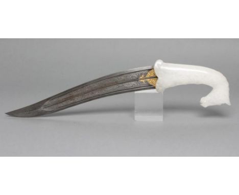 A MUGHAL STYLE DAGGER, the 11 1/2" serpentine damascus blade with gilt inlaid ricasso decoration and twin fullers, mounted by