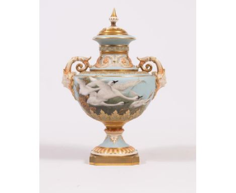 A ROYAL WORCESTER CHINA VASE AND COVER, 1908, of flared form with leaf moulded sloping shoulders, scroll handles with mask te