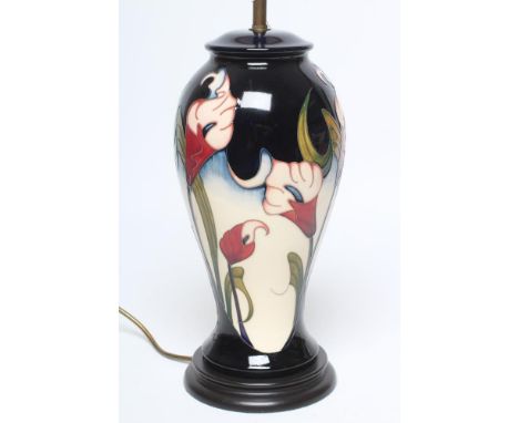 A MOORCROFT POTTERY "CALLA LILY" PATTERN TABLE LAMP BASE, modern, of inverted baluster form tubelined and painted in shades o