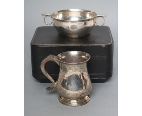 A SILVER CHRISTENING PORRINGER, maker Thomas Bradbury & Sons, Sheffield 1925, of plain flared cylindrical form, the two finge