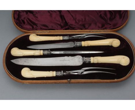 A VICTORIAN FIVE PIECE CARVING SET, maker Samuel Biggin & Son, Sheffield 1889, with reed carved ivory pistol grip handles, an