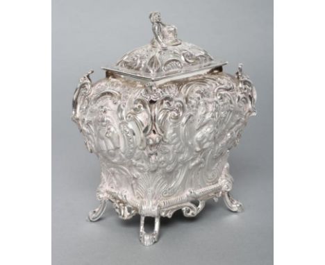 AN EARLY VICTORIAN SILVER CHINOISERIE TEA CADDY AND COVER, maker's mark WH, London 1839, of inverted oblong baluster form rai