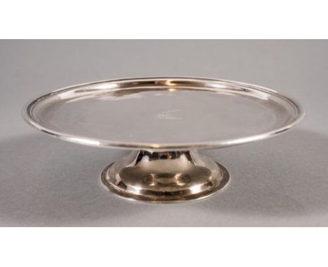 A QUEEN ANNE IRISH SILVER FOOTED WAITER, maker Edward Workman, Dublin 1708/9, of slightly dished circular form with reeded ri