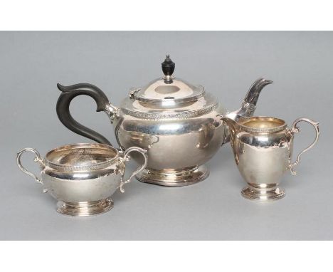 A COMPOSITE THREE PIECE SILVER TEA SERVICE, maker Adie Bros., Birmingham 1922/23/24, similar to the previous lot, comprising 