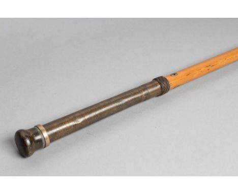 A GENTLEMAN'S NOVELTY MALACCA CANE, 19th century, the metal pommel unscrewing to reveal an 8 1/2" telescope with a brass case