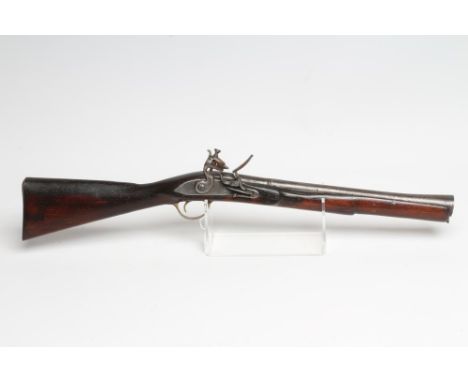 A FLINTLOCK BLUNDERBUSS, the 16" barrel flared to the end, plain action, full length stock and brass trigger guard, 29 3/4" l