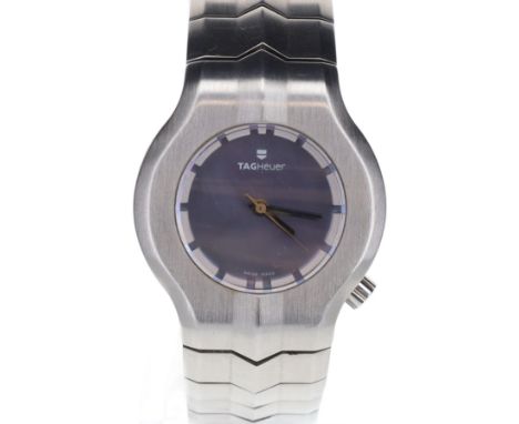 Tag Heuer - Alter Ego Steel Quartz Watch. Swiss quartz movement. Case and bracelet made from stainless steel. Sapphire crysta