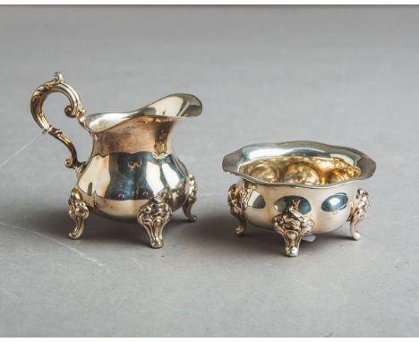 2-teiliges Konvolut von Silberteilen 835 Silber, bestehend aus: 1x Sahnegießer u. 1xZuckerschälchen, je gestempelt: Halbmond 