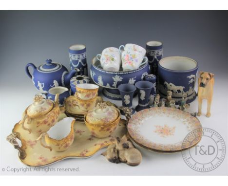 A collection of Wedgwood and Adams Jasper wares, including a pair of spill vases, 17cm, a teapot and cover, a hat pin holder,