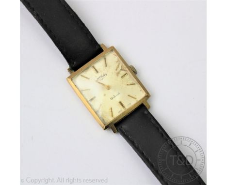 A 9ct gold Rotary wristwatch, London 1968, the rectangular face with champagne dial and gold batons, one hand, inside case st