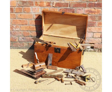A pine dome top box, 61cm wide, enclosing a small selection of tools (Qty)