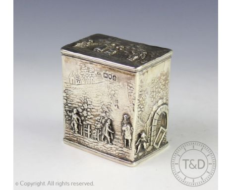 A Victorian silver tea caddy, Maurice Freeman, London 1899, the rectangular box and cover embossed in high relief with a Dutc