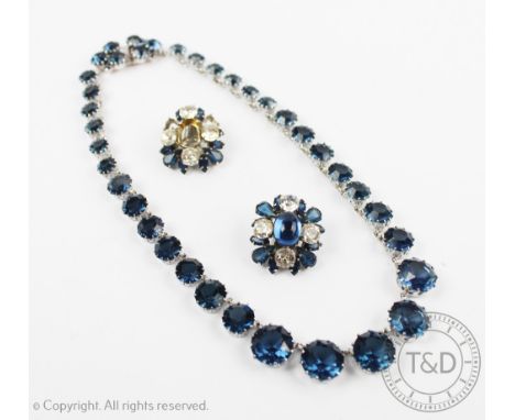 A Christian Dior necklace, designed as a riviere of blue faceted stones, all set in white metal, clasp stamped 'Chr. Dior 196