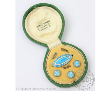 An Edwardian cased set of silver and blue enamel dress studs, stamped verso 
