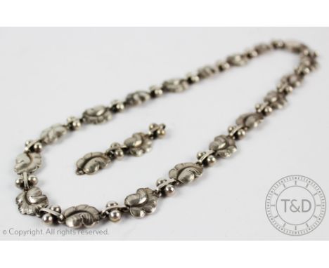 A Georg Jensen silver Moonlight Grapes necklace, model number 96A by Harald Nielsen, designed as links of leaves and berries 