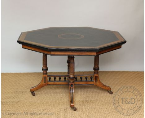 A Victorian ebonised walnut octagonal centre table in the manner of Lamb of Manchester, with turned and spiral fluted legs an