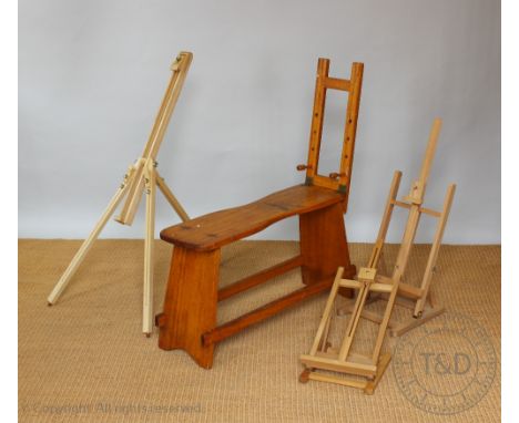 A vintage pine artist easel / seat, on standard end supports, 102cm H x 98cm W, with three modern easel (4)