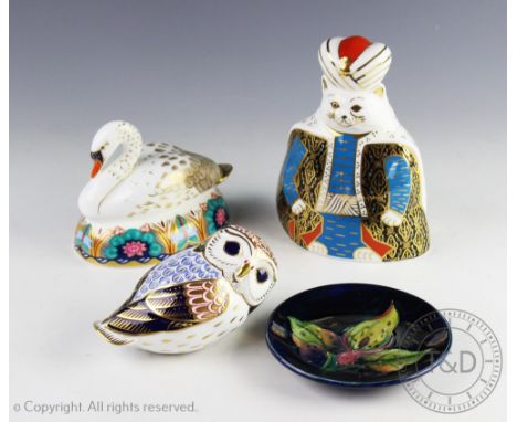 Three Royal Crown Derby Imari paper weights, comprising an owl with gold stopper, 13cm, a nesting swan with gold stopper, dat