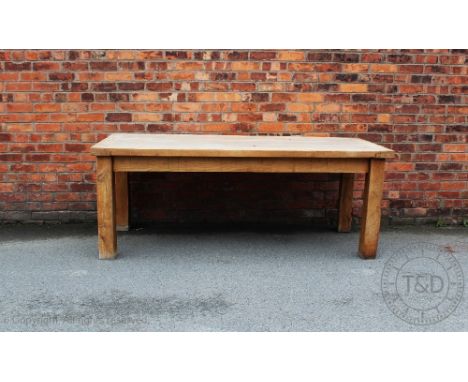 A modern light oak farmhouse type kitchen dining table, the three plank top with cleated ends, on square legs, 81cm H x 213cm