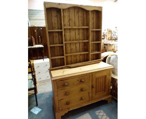 Stripped pine Welsh dresser with three drawers, under cupboard and multi shelf top