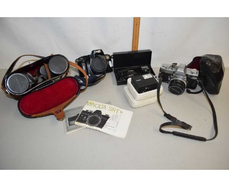 A Minolta ST101 camera together with a Canon EOS 1000F camera, further Olympus camera and a pair of Asahi binoculars