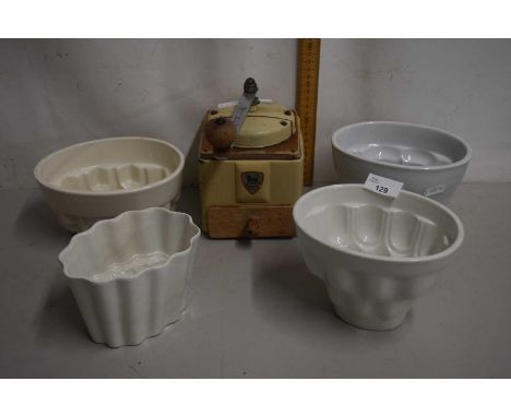 A group of jelly moulds and a coffee grinder