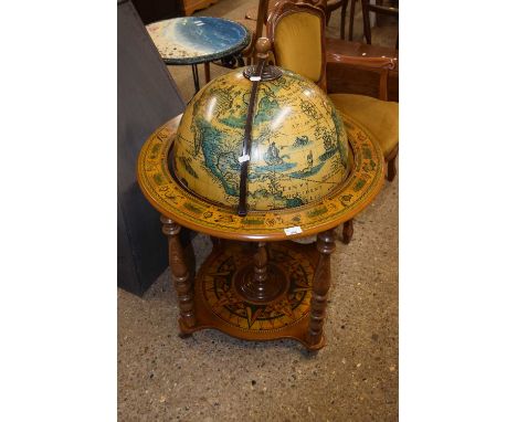 A retro globe formed drinks cabinet