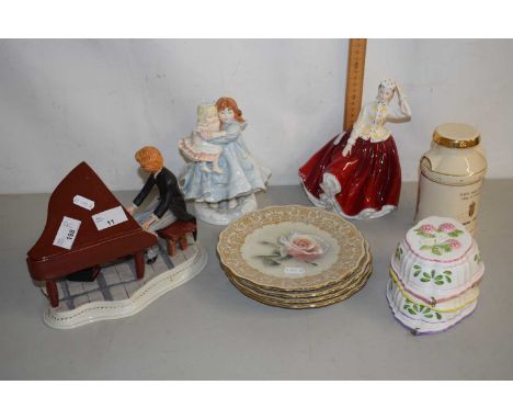 A ceramic model of a piano player