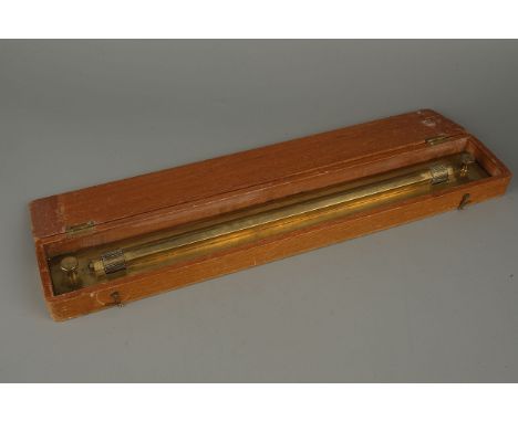 A Brass Roller Rule,constructed of brass in original mahogany case, rule signed 'Hall Harding ltd, London', 56cm wide