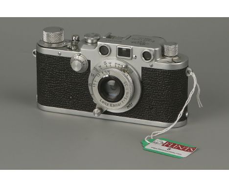 A Leica IIIc Rangefinder Camera,chrome, serial no. 401651, with Leitz Elmar f/3.5 50mm lens, shutter working