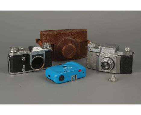 A KW Praktiflex Camera,together with a Pentacon F body (a lot)
