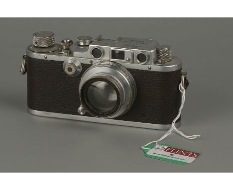 A Leica IIIb Rangefinder Camera,chrome, serial no. 280636, with Leitz Summar f/2 50mm lens, shutter working