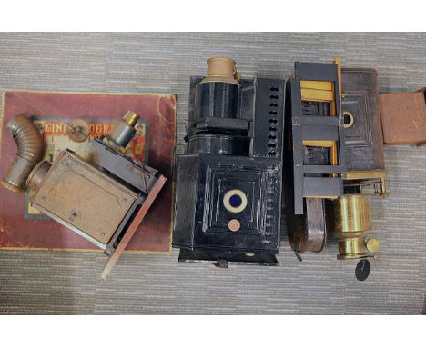 A Collection of Three Magic Lanterns,two with brass lenses and tin plate bodies, the third for 35mm movie film with original 