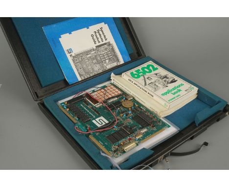 A Synertek Systems Synertek SYM-1" and is a 6502 Development system, c.1975, in original case with original booklets includin