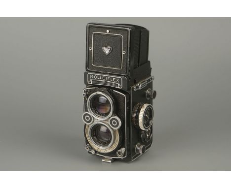 A British Airforce Rollei Rolleiflex TLR Camera,with Carl Zeiss Planar f/3.5 75mm lens, marked to top '14A/5997', along with 