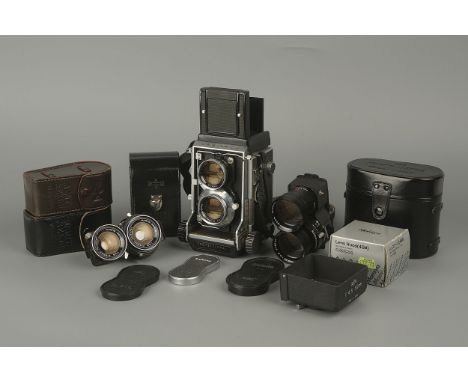 A Mamiya C3 TLR Camera,with Mamiya-Sekor f3.5 105mm, Mamiya-Sekor f/4.5 55mm and Mamiya-Sekor f/4.5 180mm, together with vari