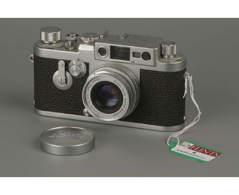 A Leica IIIg Rangefinder Camera,chrome, serial no. 868959, with Leitz Elmar f/2.8 50mm lens, shutter sticking