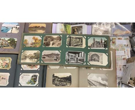 VINTAGE POSTCARD &amp; CIGARETTE CARD COLLECTION - in four albums and loose, approximately 700 postcards showing busy street 