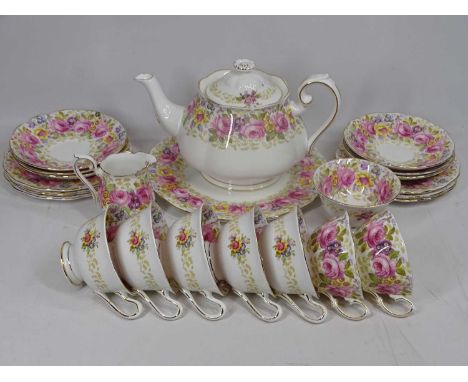 ROYAL ALBERT 'SERENA' TEASET, twenty three pieces to include teapot and cover, seven cups, six saucers, six side plates, sand