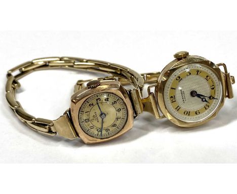 9CT GOLD LADY'S WRISTWATCHES (2) - a 25mm diameter case example, the dial marked 'J W Benson, London', set with Arabic numera