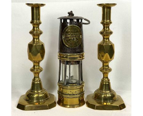 HAILWOODS VINTAGE MINER'S LAMP and a pair of Victorian brass Queen of Diamonds candlesticks, 25cm and 29cm heights respective