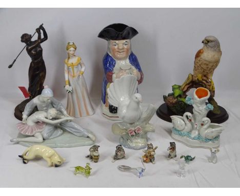 MIXED COMPOSITION FIGURAL &amp; ANIMAL COLLECTABLES to include a vintage Toby jug, Spanish porcelain figurines, Country Artis